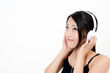 attractive asian woman listening music