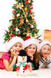 A snowman and three kids