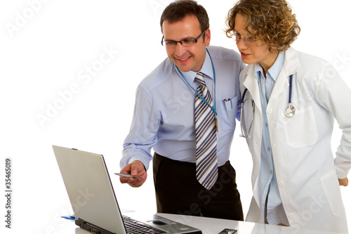 Photo: Doctors analyze the business plan - doctors at work Doctors analyze the business plan - doctors at work