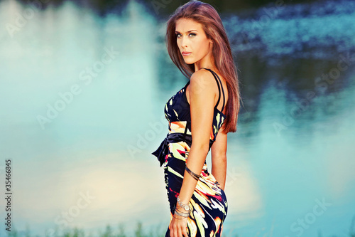 Photo: woman by the river portrait woman by the river portrait