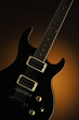 Black Electric Guitar on Orange