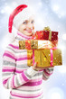 Santa girl with Christmas gifts Santa girl with Christmas gifts