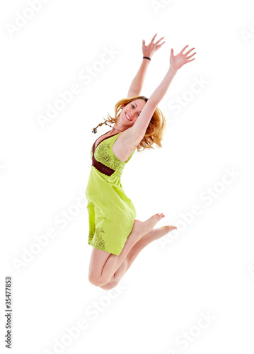 Photo: Beautiful girl jumping, isolated Beautiful girl jumping, isolated