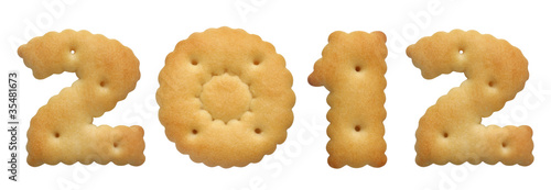 Photo: new year 2012. cracker in shape numeral on white background new year 2012. cracker in shape numeral on white background