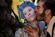 Male vampire zombie biting woman