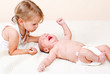 Toddler and newborn brother