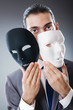Industrial espionate concept with masked businessman Industrial espionate concept with masked businessman