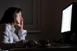 Photo: Business person working overtime with neck pain Business person working overtime with neck pain