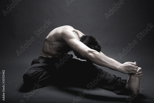 Foto: Man stretching his Body Man stretching his Body