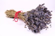 Bunch of dried lavender tied with a red string on white Bunch of dried lavender tied with a red string on white