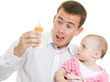 A young father with a baby on a white background.