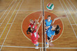 girls playing volleyball indoor game