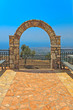 Stone arc and cityscape in Greece