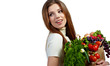woman holding a bag full of healthy food. shopping .