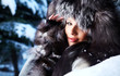 Beauty woman in the winter scenery