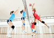 Photo: girls playing volleyball indoor game girls playing volleyball indoor game