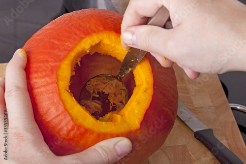 Photo: cooking hokkaido pumpkin soup in a modern kitchen. cooking hokkaido pumpkin soup in a modern kitchen.