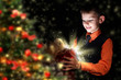 Child opening a magic gift box