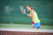pretty, young female tennis player on the tennis court pretty, young female tennis player on the tennis court