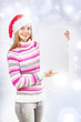 Santa girl holding blank sign Santa girl holding blank sign
