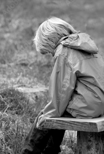 Photo: A sad and troubled little boy A sad and troubled little boy