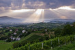 Sun rays shining down a small town