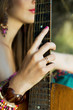 hand on a guitar hand on a guitar