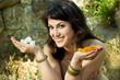 Beautiful woman with dried apricots and turkish delight Beautiful woman with dried apricots and turkish delight
