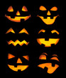 Carved Jack-o-lanterns lit for Halloween
