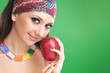 fashion woman with red apple on the green background