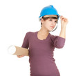 female architect in hardhat holding blueprints