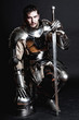 Great knight holding his sword and helmet