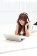 pretty asian woman using laptop