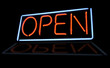 Open neon light sign with reflection Open neon light sign with reflection