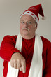 Foto: Weihnachtsmann zeigt mit Finger Weihnachtsmann zeigt mit Finger