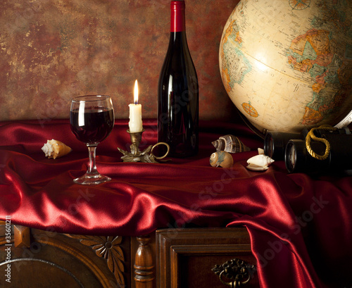 Photo: Still-life with red wine and globe Still-life with red wine and globe