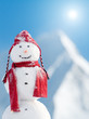 Snowman in winter mountains