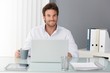 Happy businessman in office Happy businessman in office