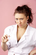 Female doctor holding syringe