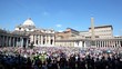 Crowd of tourist gathered on square near Saint Peters Cathedral