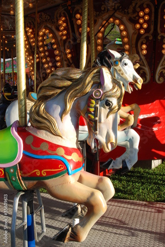 Photo: Colorful Carousel horses at a Fair Colorful Carousel horses at a Fair