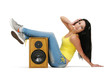 Young beautiful girl in headphones with speaker Young beautiful girl in headphones with speaker