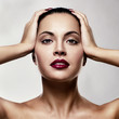 Photo: Close-up portrait of young woman with glamour make-up Close-up portrait of young woman with glamour make-up