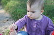 baby is exploring its feet