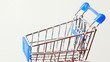 Little metallic toy trolley turning around