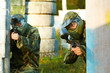 two paintball players