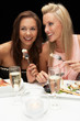 Foto: Young women in restaurant Young women in restaurant