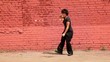 Fat woman in black clothing dance in modern style