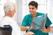 Senior patient with young doctor