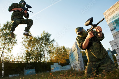 Photo: paintball player under attack paintball player under attack